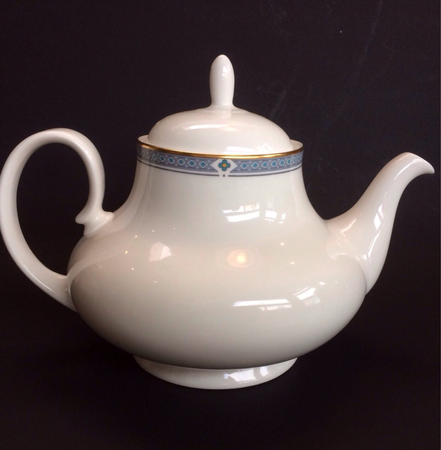 A Classic White Bone China English Teapot