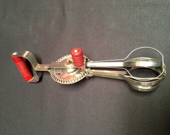 Vintage Hand Mixer with Red Bakelite handles
