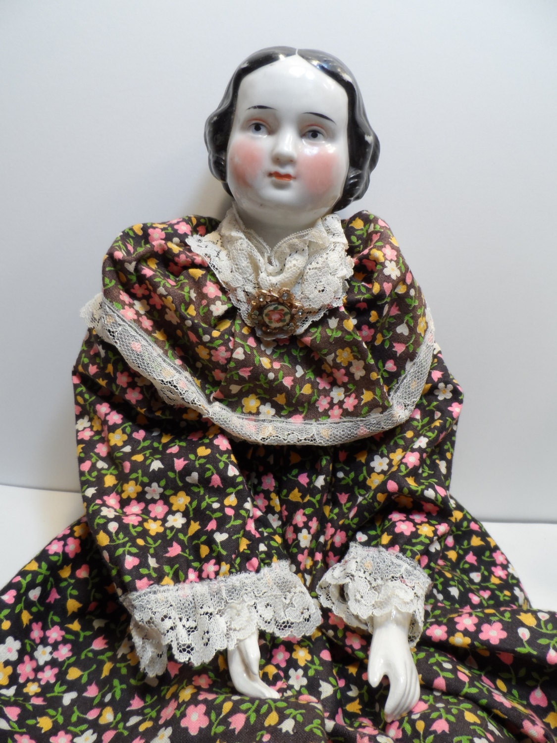 porcelain doll with cloth body