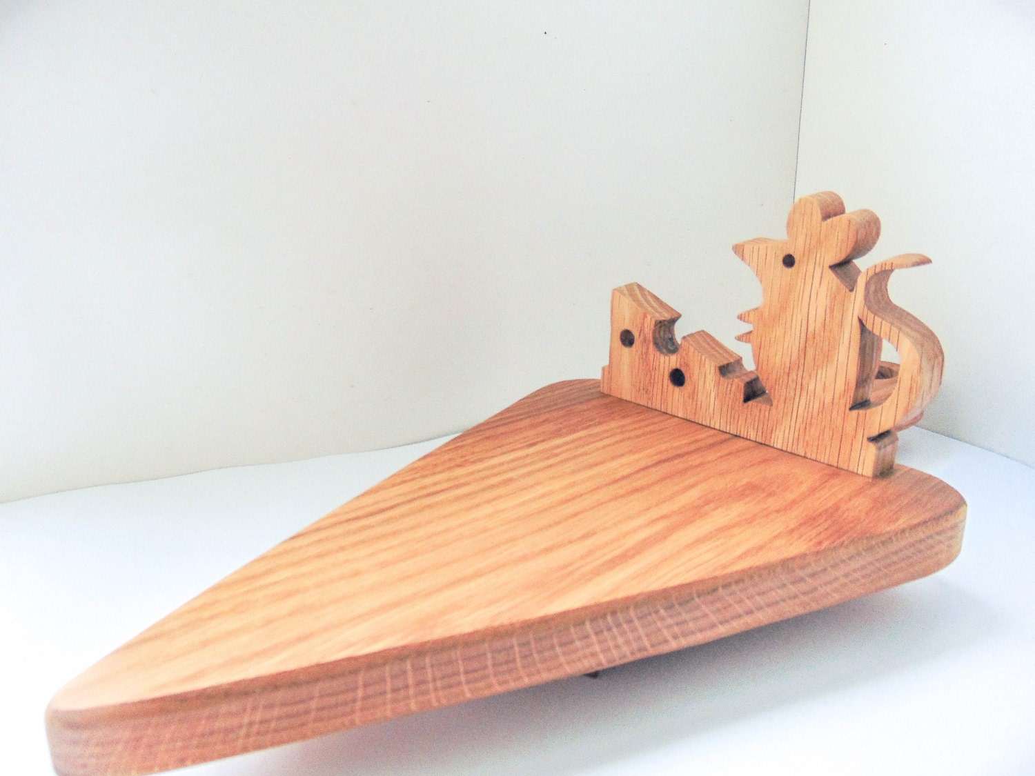 Decorative cheese cutting board made of oak