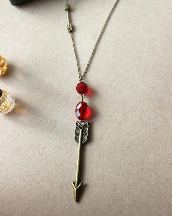 Antique Bronze Arrow pendant necklace with Ruby by AllsortsBazaar