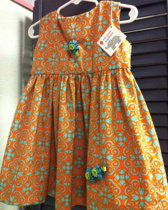 Beautiful orange & turquoise Easter dress/jumper with rick