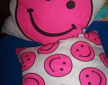 pink smiley pillow