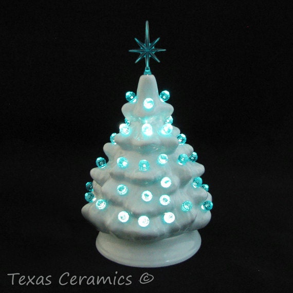 small light blue ceramic christmas tree with aqua color lights small light blue ceramic christmas tree with aqua color lights