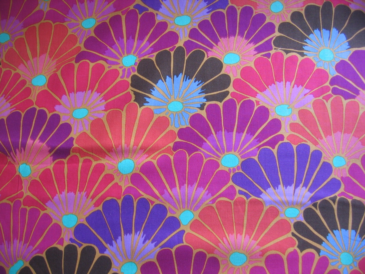 Thousand Flowers in red from the Kaffe Fassett collection