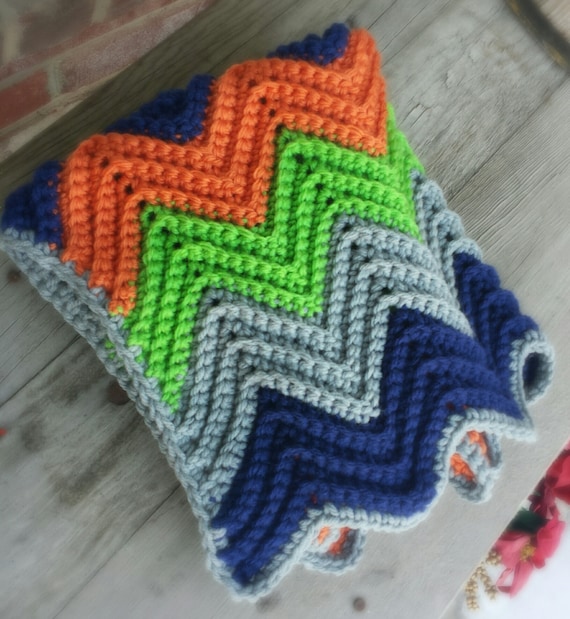 Crochet chevron baby blanket with holes for car seat straps