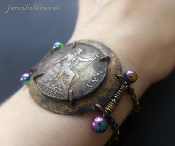 Ya'aburnee. Rustic assemblage bracelet with large coin.