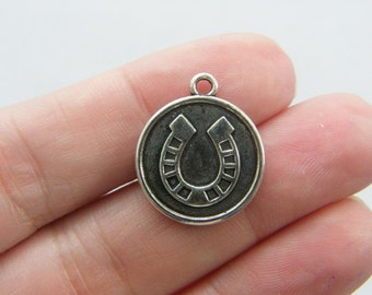 6 Horseshoe charms tibetan silver A544
