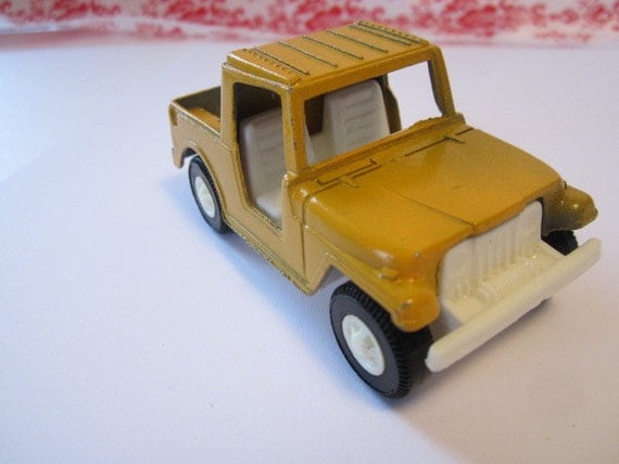 Vintage Yellow Tootsie Jeep Toy Truck from the 60's or