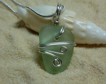 Drilled and wire wrapped seafoam green sea glass necklace with sterling silver chain