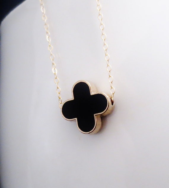 Items similar to Gold Black Quatrefoil Necklace, Floating Clover Charm ...