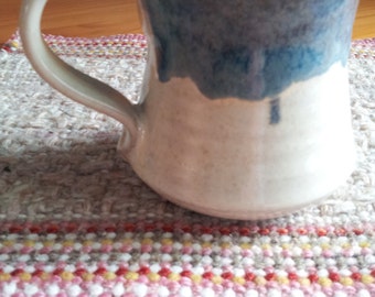New 10 oz mug in Creamy White with blue rim.