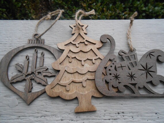 set of three wood ornaments laser cut sleigh tree holly set of three wood ornaments laser cut sleigh tree holly