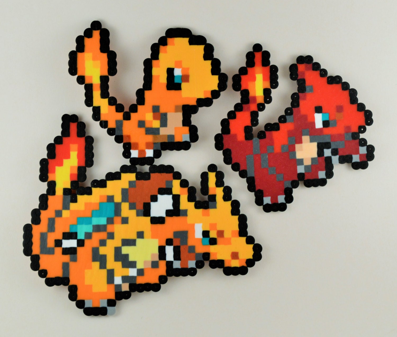 Charmander Evolution Trio Sprites Small by NostalgiaPerler