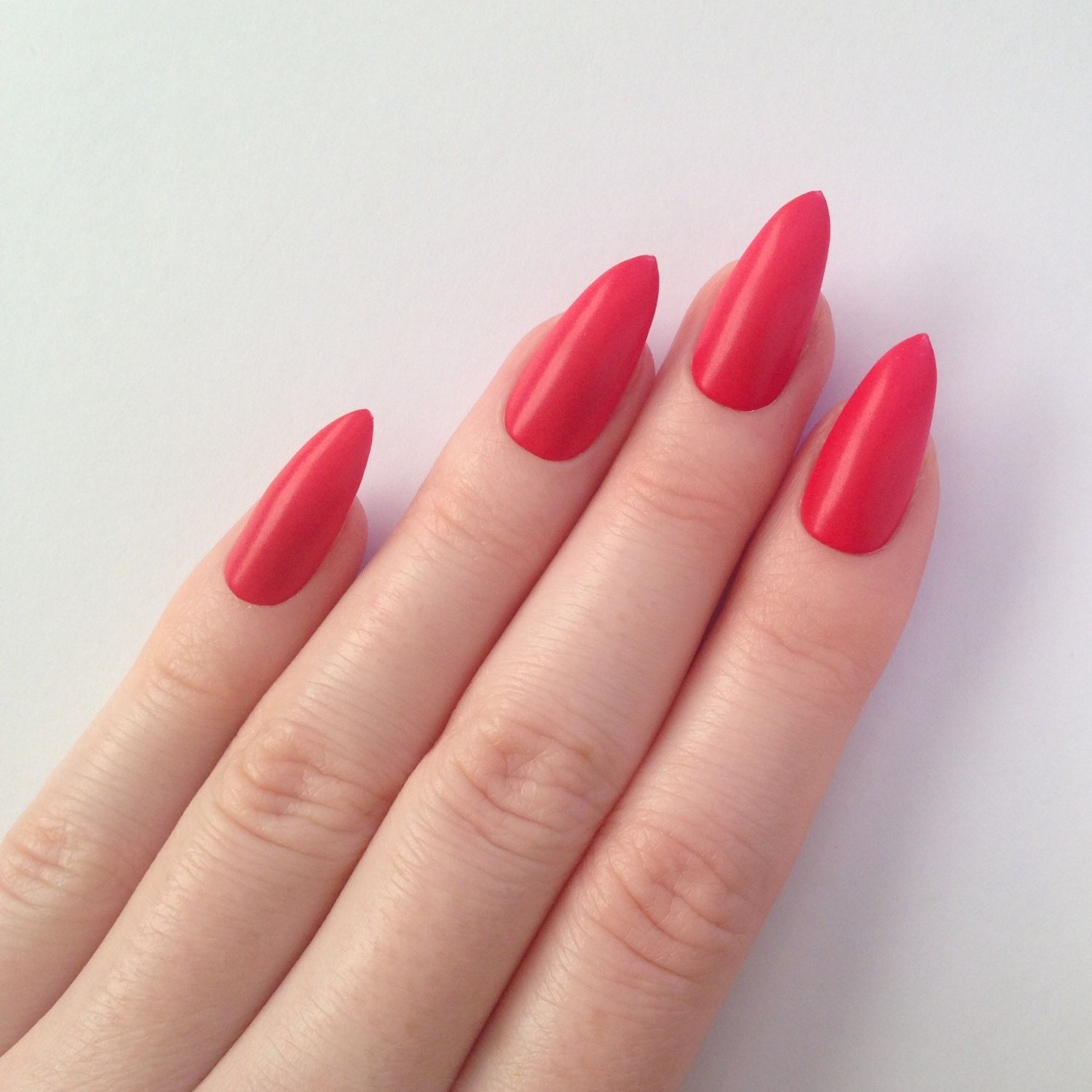 Matte passion fruit stiletto nails Nail by prettylittlepolish