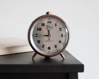 old brown alarm clock