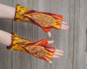Hand felted mittens in orange, yellow and maroon, with wool curls and pieces of silk fabric . OOAK
