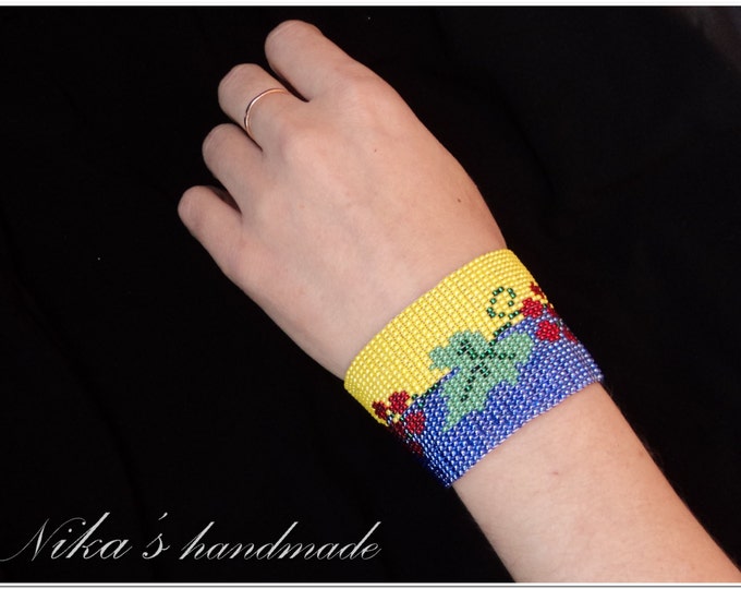 Woven beaded bracelet in national Ukrainian colours with red viburnum and leaves 6.3x8.3 in