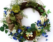 Blue Spring Wreath of Airy Woodland White, Blue, and Green Wildflowers, Nest with Speckled Robin Eggs