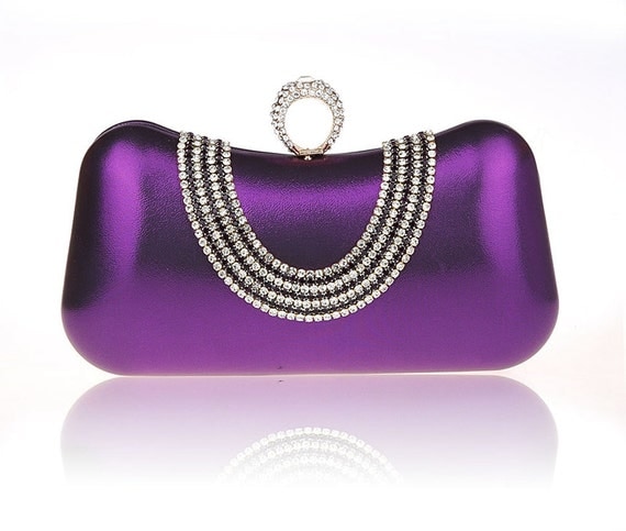 black and purple clutch bag