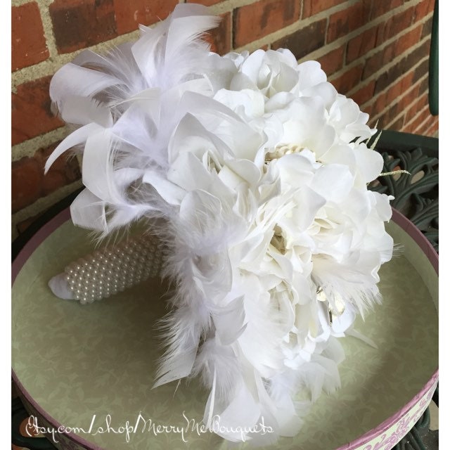 White feather hydrangea wedding bouquet. Brooch and Feather Bouquet. White wedding bouquet