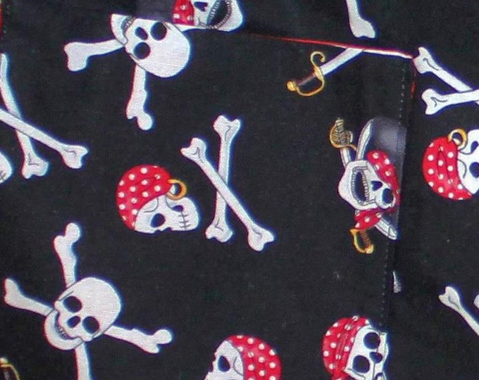 HALF PRICE ** Boys size Small Pirate Birthday Zip Front Shirt. Chest pocket. Crossbones and skulls on black background.