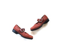 brown leather mary jane flats