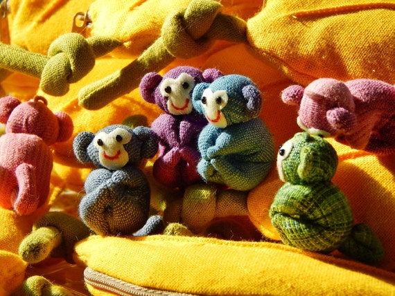 stuffed toy monkey with banana