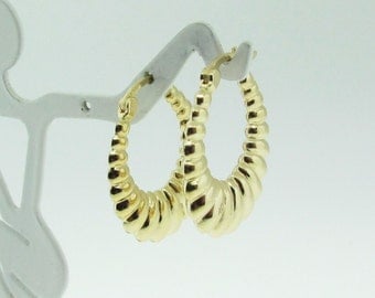 14 K gold hoop earrings.