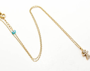 Sterling silver-gold plated pendant with zirgon and a blue bead 7039