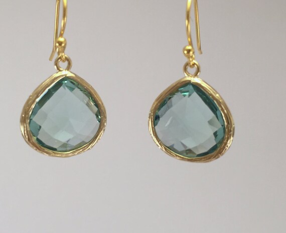 Items similar to Beautiful light green drop earrings on Etsy