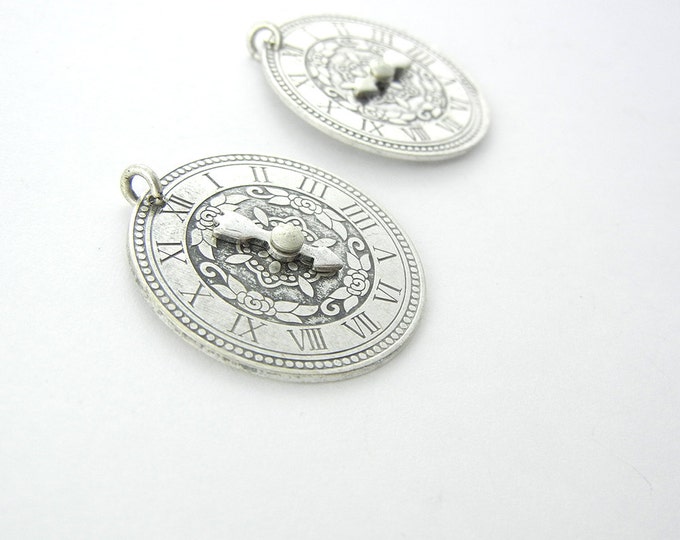 Pair of Round Clock Charms with Roman Numerals and Moving Hands