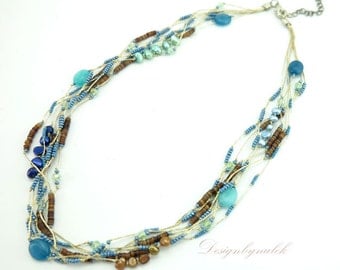 Turquoise,freshwater pearl on silk necklace.