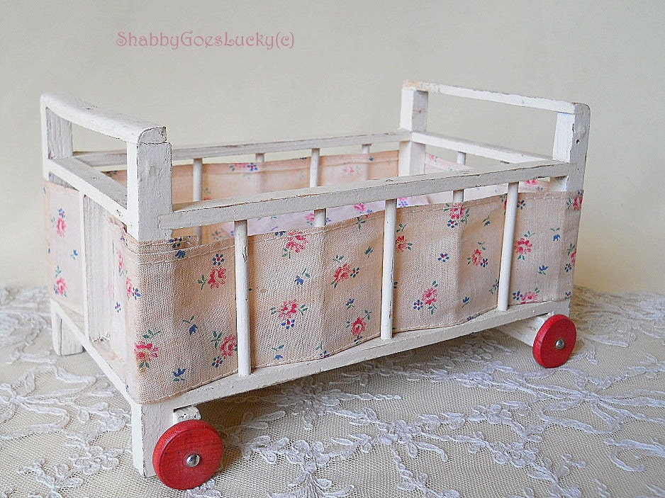 antique doll crib with wheels