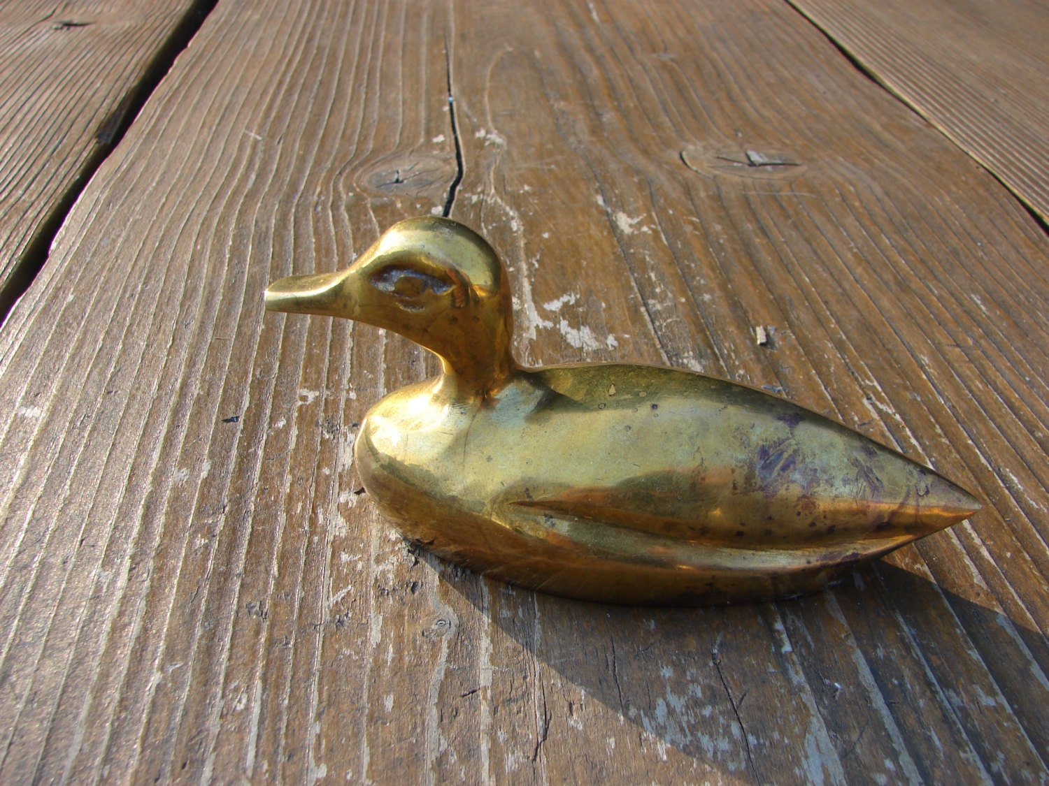 solid brass duck figurines