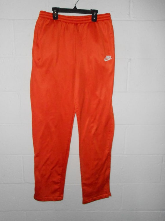 orange nike sweatpants womens