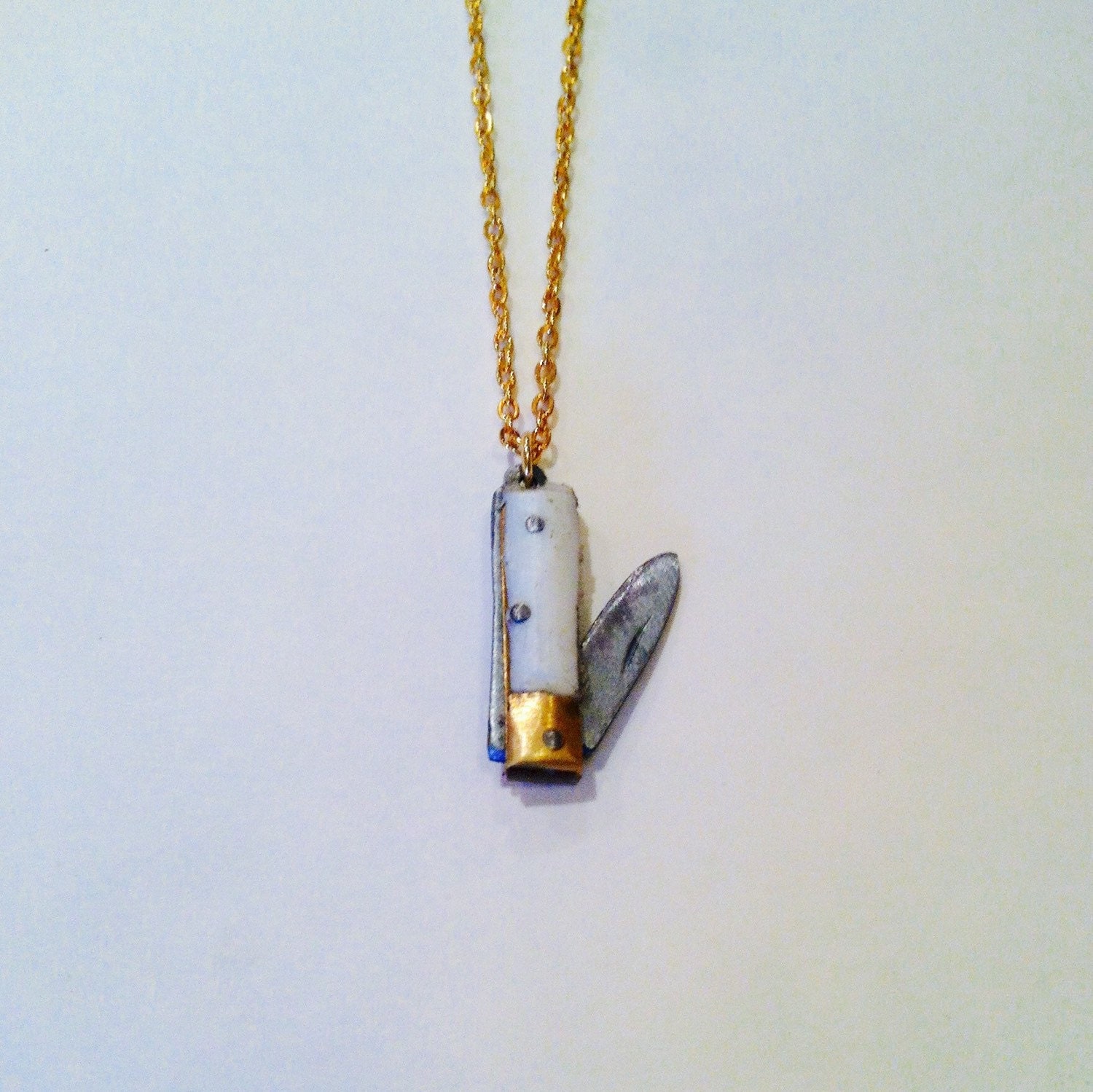 Mini knife necklace made with a real folding pocket knife