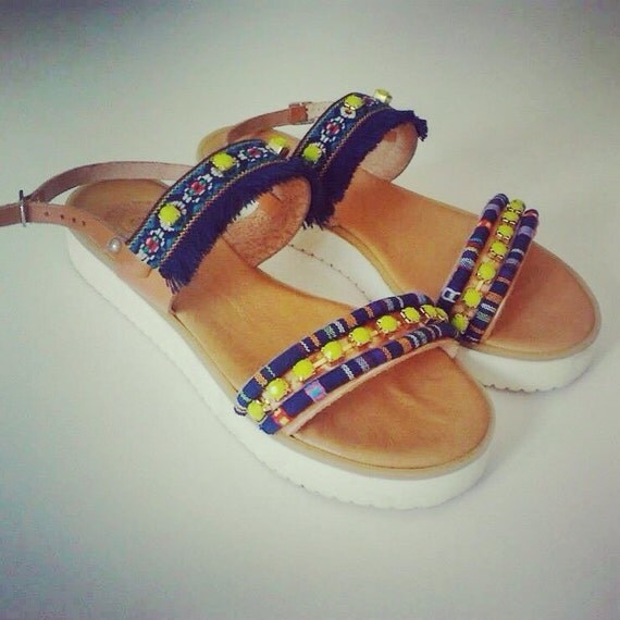White sole decorated leather sandals