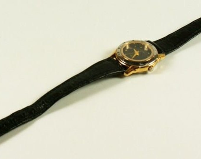 Storewide 25% Off SALE Vintage Ladies Benrus Designer Gold Tone Swiss Quartz Watch Featuring Black & Gold Bezel with Original Black Leather