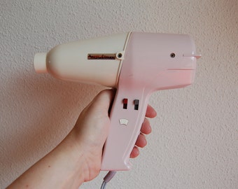 Vintage Moulinex hairdryer in pastel pink and cream