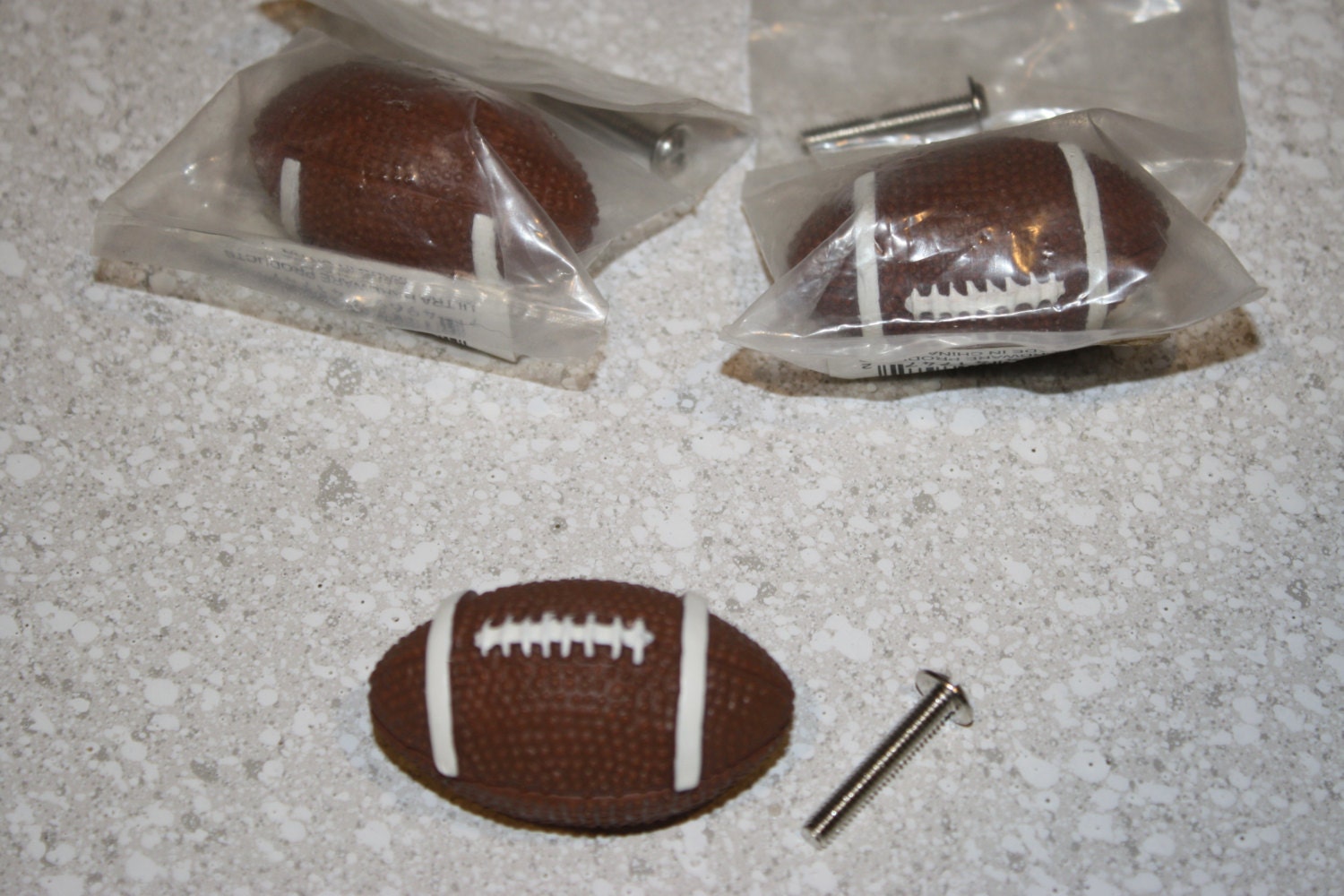 Set of three football drawer pulls, handles, football