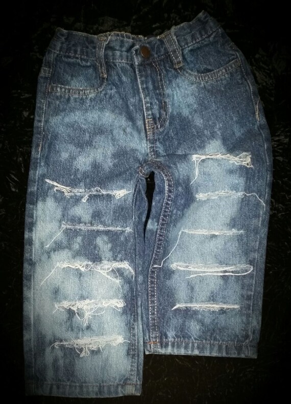 distressed jeans with chains