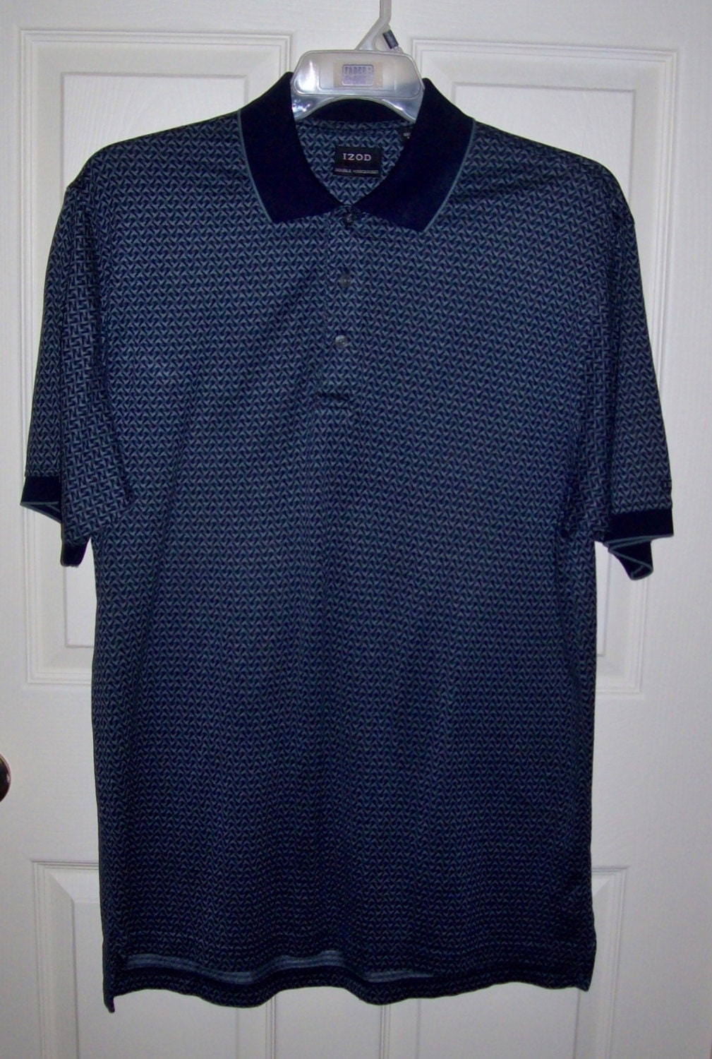 Vintage Men's Navy Blue Polo Golf Shirt by Izod Medium