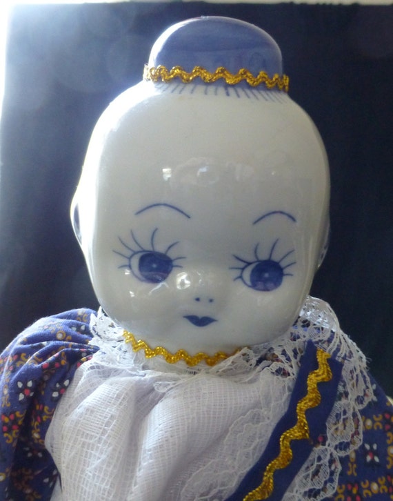 porcelain kewpie doll