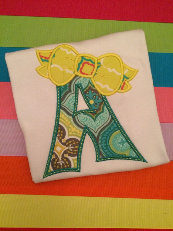 Bow Initial Appliqué Ruffle Shirt