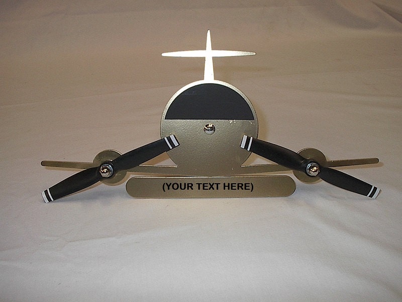 Low wing twin propeller airplane hitch receiver cover with a