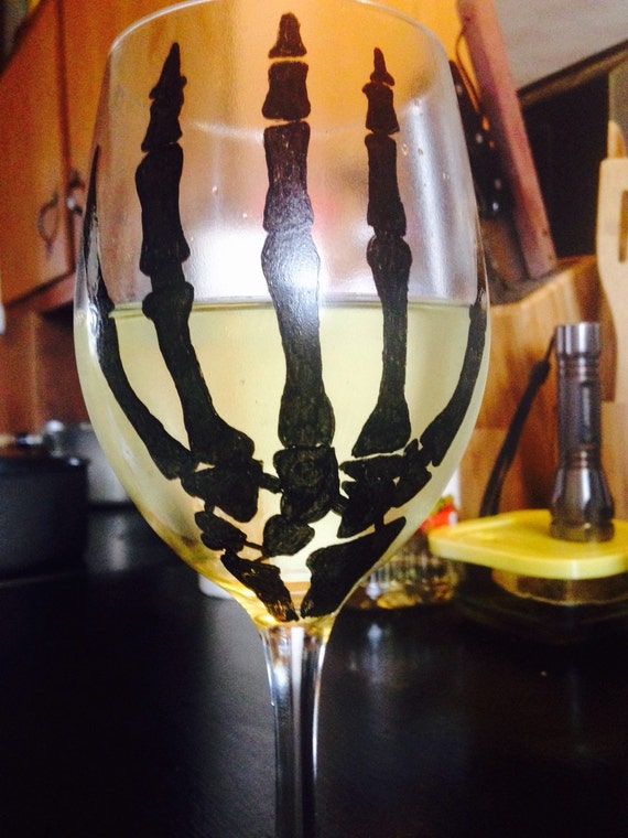 Items similar to Hand Painted Skeleton Hand Wine Glass on Etsy