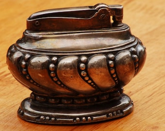 A 1930-40's Ronson Crown Cigarette Lighter, Silver Plated with some tarnish, working condition 00038