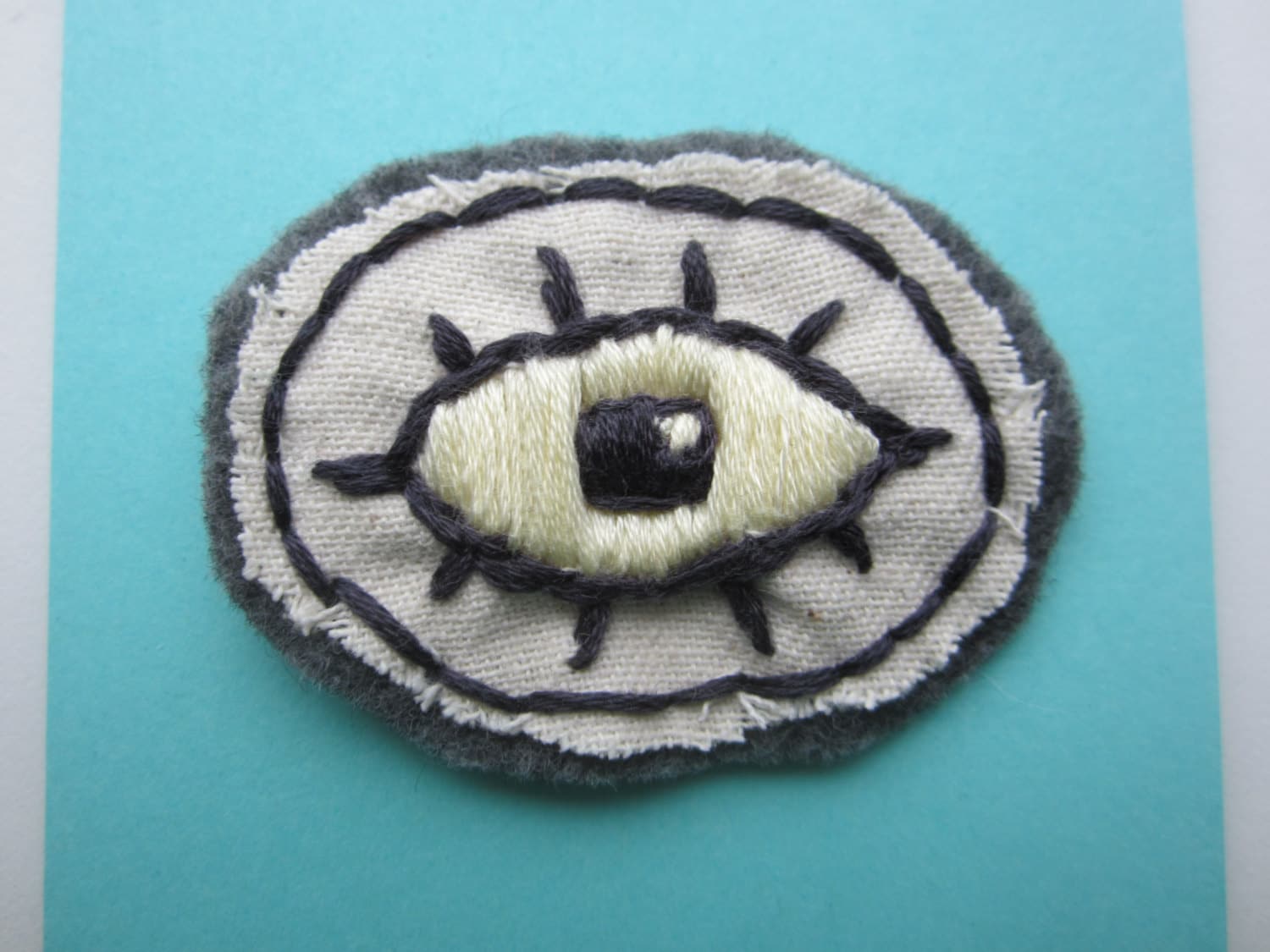 purple & yellow embroidered eye patch