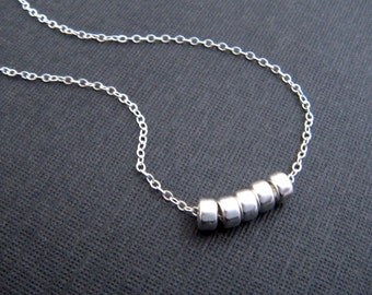sterling silver bead necklace. tiny everyday. small simple dainty delicate modern minimalist jewelry. beaded 5 donut beads. gift for her